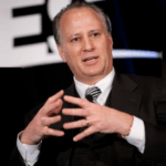 Laurence Allen speaking at an Institutional Limited Partners Association Conference in Miami